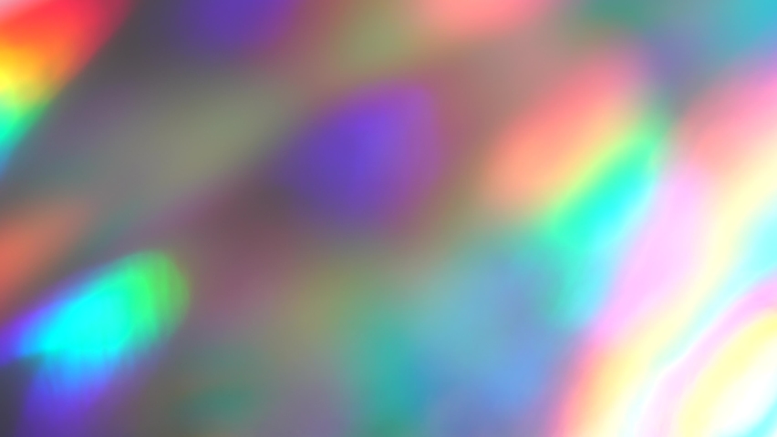 Spectral iridescent blurred neon, purple, blue, pink rays, light leaks, reflections, glare, bright colors. Visual Psychedelic abstract art | Shutterstock HD Video #1060387961
