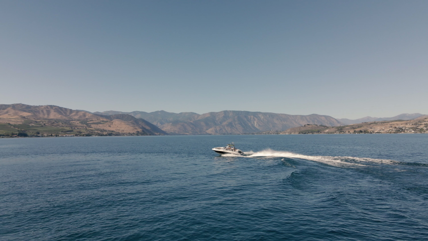 Boat Passing Under Camera During Summer Season at Lake Chelan Washington