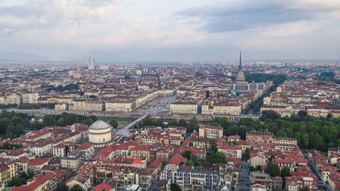 Establishing Aerial View Shot of Turin IT, Mole Antonelliana on the horizon, Torino Skyline, Italy