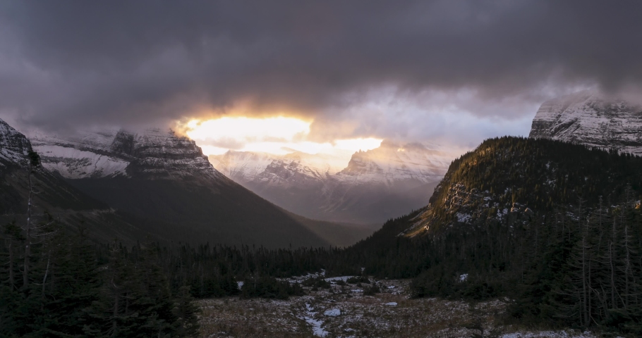 Snow falls at Logan Pass in Glacier National Park, Montana, USA.