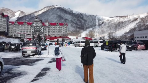 Hakuba, Japan - January 1 ,2020 : Hakuba Cortina Ski Resort with blue sky in wintertime in Hakuba, Japan on January 1 ,2020.
