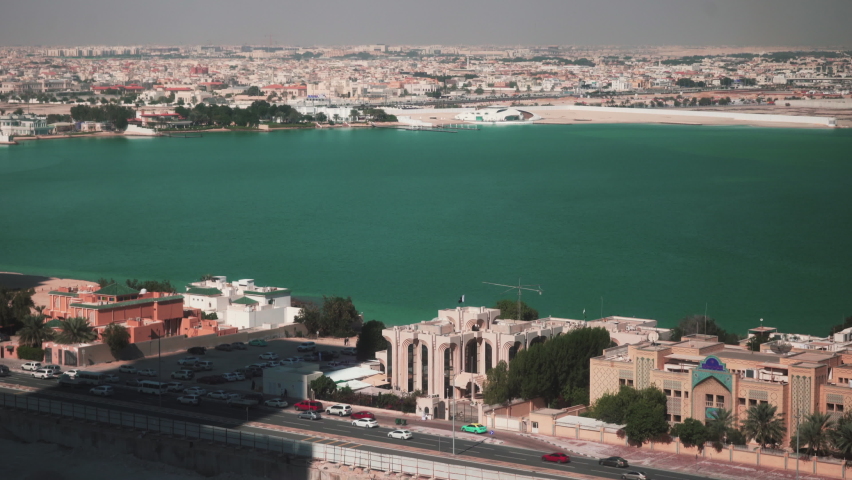 Aerial view of Doha, Qatar in sunny summer day. Building new tourist places in middle east.