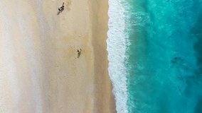 Aerial drone video of iconic turquoise and sapphire bay and beach of Myrtos, Kefalonia (Cephalonia) island, Ionian, Greece. Myrtos beach, Kefalonia island, Greece. Beautiful view of Myrtos beach.