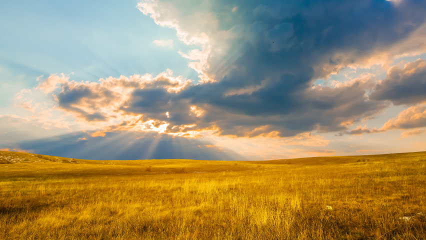 Dramatic sunset over the grass prairie, time lapse scene | Shutterstock HD Video #1060437916