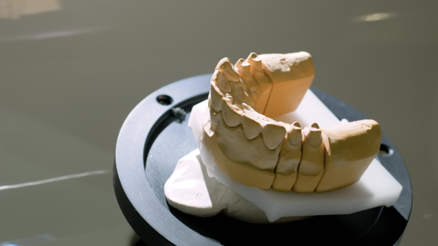 Automatic 3D dental scanner for dental gypsum model scanning and measuring with rotating platform - close up view. Stomatology, medicine, restoration, laboratory equipment, techonology concept