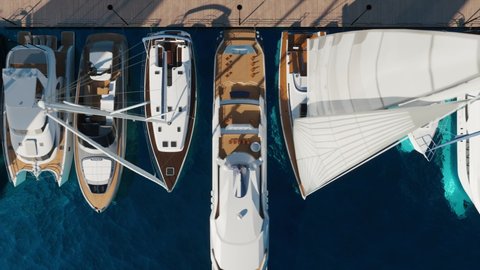 Aerial view of the yacht club. Aerial top-down view of docked sailboats. Top down view of yachts