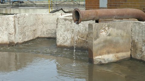 Concrete supply channel for the second stage of sedimentation of municipal wastewater. Wastewater treatment plant.