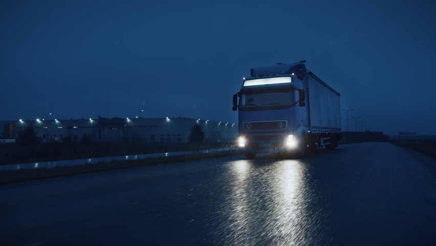 Futuristic Technology Concept: Autonomous Semi Truck with Cargo Trailer Drives at Night on the Road with Sensors Scanning Surrounding. Special Effects of Self Driving Truck Digitalizing Freeway Royalty-Free Stock Footage #1060479169