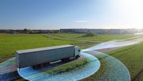 Futuristic Technology Concept: Big Autonomous Semi Truck with Cargo Trailer Drives on the Road with Sensors Scanning. Special Effects of Self Driving Truck Analyzing Freeway. Aerial Drone Shot - Powered by Shutterstock - Get 15% off with code: PIKWIZARD15