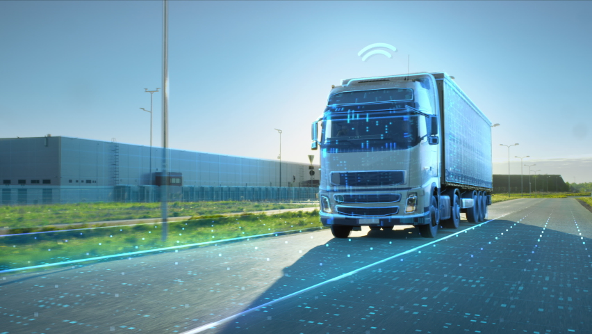 VFX Concept: Big White Semi-Truck with Cargo Trailer Drives on the Road is Transformed with Graphics and Special Effects Into Digitalized Version Digital Twin Futuristic Concept of Autonomous Vehicle Royalty-Free Stock Footage #1060479181