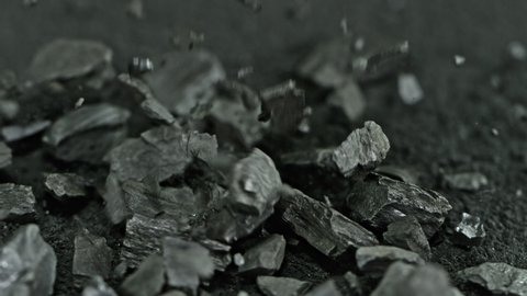 Super Slow Motion Shot of Falling and Crashing Coal at 1000 fps.