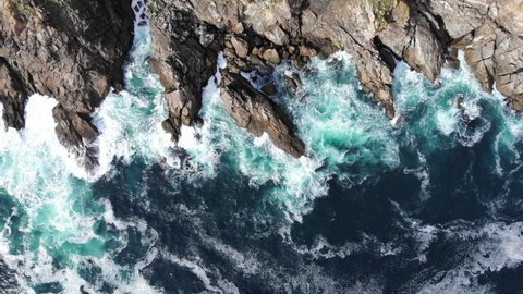 Scenic View Of Extreme Waves Splashing On The Rugged Cliff In Costa Da Morte, Galicia, Spain - aerial drone