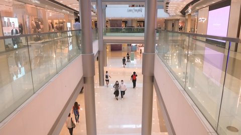 Hong Kong , Hong Kong Island / China - 10 08 2020: Shoppers are seen at a high-end luxurious IFC shopping mall in Hong Kong.