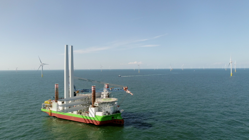 Offshore wind farm in sea | Shutterstock HD Video #1060492831