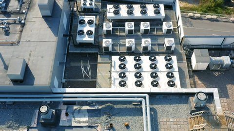 Heating, ventilation and air conditioning systems installed on the rooftop. Aerial top down view