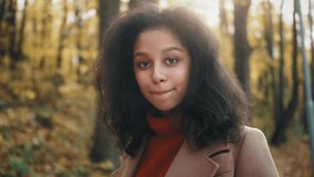 Autumn Outdoor Portrait Of Beautiful African American Young Woman - , happy student female in city park, tourist, safe travel