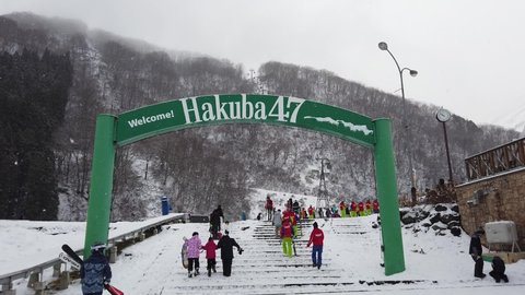 Hakuba, Japan - Jan 2 ,2020 : Walk through the entrance of Hakuba 47 with many skier in Hakuba, Japan on Jan 2 ,2020.