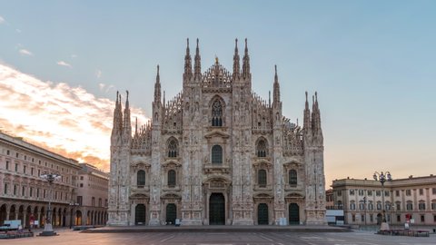 Milan Italy time lapse 4K, city skyline sunrise timelapse at Milano Duomo Cathedral