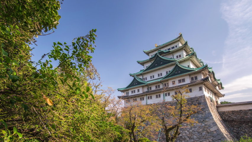 Nagoya Aichi Japan time lapse 4K, city skyline timelapse at Nagoya Castle in autumn season
