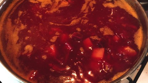 Red vegetable soup close-up. Beetroot soup, borscht