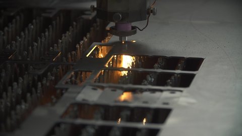 Laser cutting metal sheet with bright sparkles
