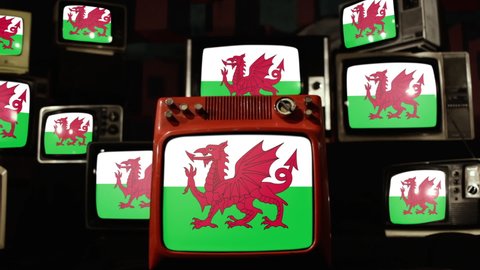 Flag of Wales and Stack of Vintage TVs. 