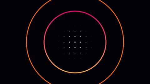 Animation of orange and pink rings with blue and yellow dots moving hypnotically from a central point in seamless loop on black background. Colour, light and movement concept digitally generated image Stock Video