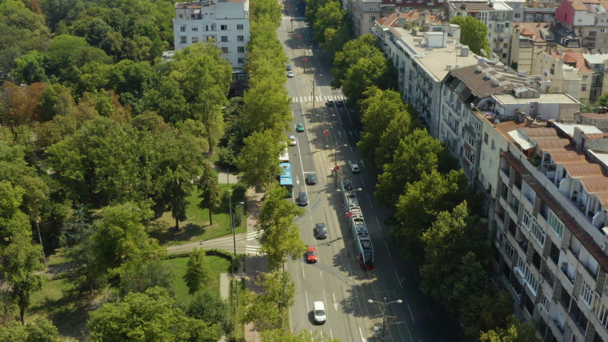 Aerial shot Belgrade Serbia. Beautiful flight on a drone through the streets of the city, where you can see the old and new city, streets, old buildings, transport, a beautiful urban ladscape.