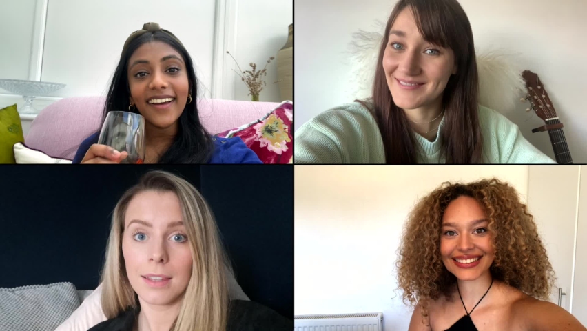 Four female friends saying cheers over video chat  Royalty-Free Stock Footage #1060555105