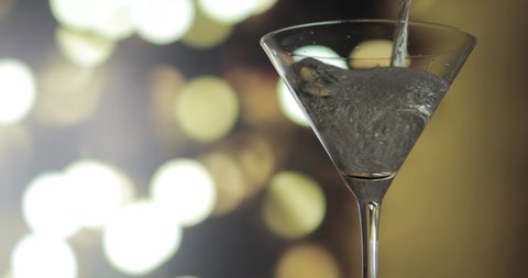 Martini Cocktail Poured And Olives Added	
