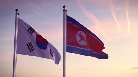 South and North Korea flags show the tension and confrontation between Seoul and pyongyang. Korean crisis on the DMZ and from nuclear missiles.