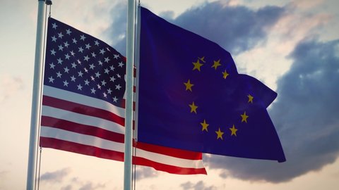 United states and European union flags on a flagpole showing political relations. America and Europe .