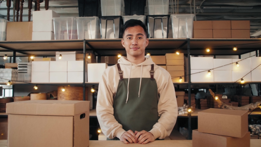 Small business owner in fabric workshop, asian man portrait, korean craftsman standing in warehouse stock factory, businessman, handmade e-commerce diy | Shutterstock HD Video #1060628263
