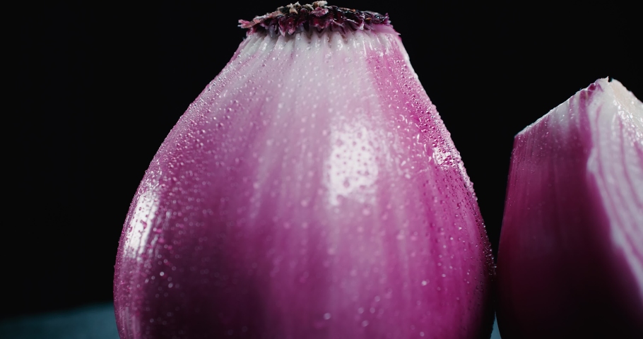 Purple Onions spining black bakcground 4K