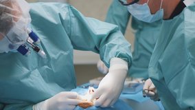 Two professional cooperative doctors doing dental surgery treating root canals or installing dental implants into patient's mouth. Surgical operation. Stomatology. - Powered by Shutterstock - Get 15% off with code: PIKWIZARD15