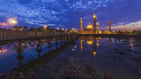 Beautiful sunrise view Time Lapse at Tengku Ampuan Jemaah Mosque by a pond in Selangor, Malaysia at dawn. Zoom in motion timelapse. Prores 4KUHD