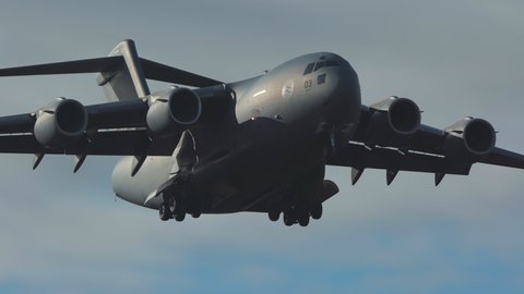 oslo airport norway - ca october 2020:  military airplane SAC 03 NATO Strategic Airlift Capability boeing c-17 arrivals silhouette close view