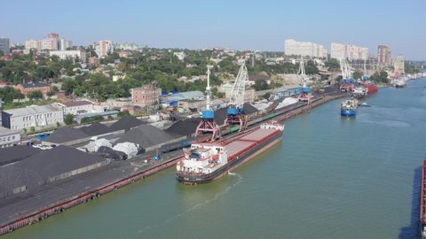 cargo port of Rostov-on-Don, anchorage of barges for loading and unloading, southern Russia, industry of the city.