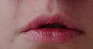 girl's mouth close-up, moving her lips and talking