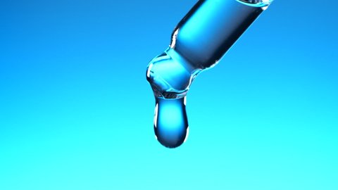 Water dropper in slow motion on blue background