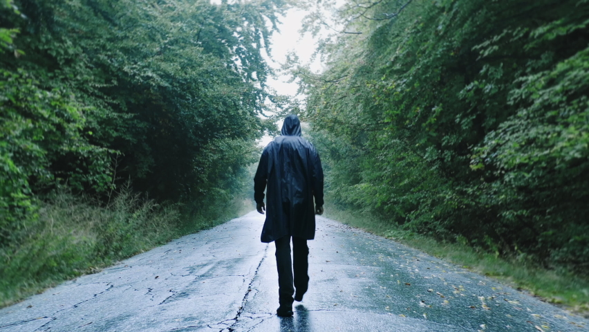 Sadness Depression Darkness Silhouette Of Sad Man Walking On Path With Trees In The Misty Mountains Loneliness Backpacking Slow Motion Drone Royalty-Free Stock Footage #1060669915