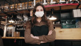Portrait of owner woman cafe wearing face medical mask, Cafe staff working in protective masks. Owner pizzeria. New Life After Covid-19. Business reopen after coronavirus quarantine is over. - Powered by Shutterstock - Get 15% off with code: PIKWIZARD15
