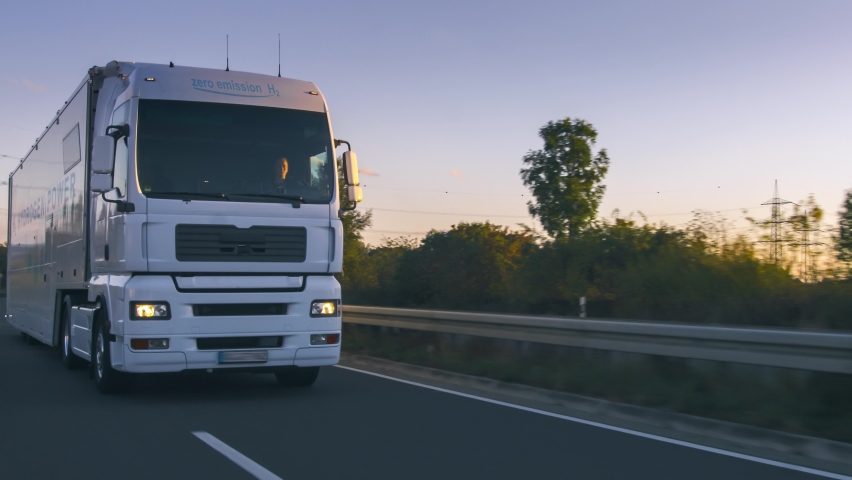 Hydrogen fueled truck on the road drinving. h2 combustion Truck engine for emission free ecofriendly transport.  | Shutterstock HD Video #1060675672