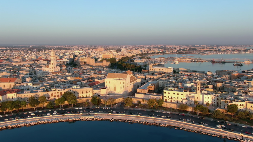 aerial view of bari city center historic town drone fly over st nicholas basilica at dawn