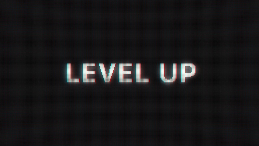 Level Up text message appear on old display. Pixelated text animated on retro monitor with chromatic abberations. 4k 60 fps Royalty-Free Stock Footage #1060685719