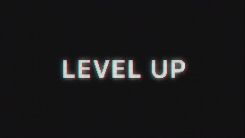 Level Up text message appear on old display. Pixelated text animated on retro monitor with chromatic abberations. 4k 60 fps