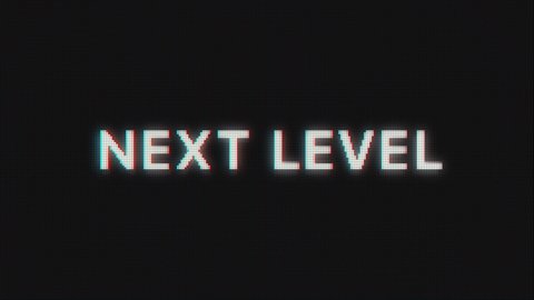 Next Level text message appear on old display. Pixelated text animated on retro monitor with chromatic abberations. 4k 60 fps