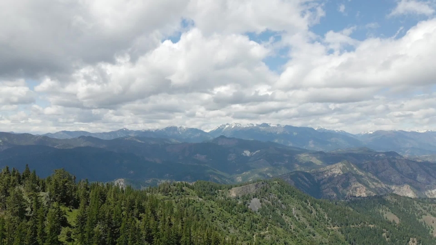 Scenic aerial view of Cascade Range in Washington State on summer day.