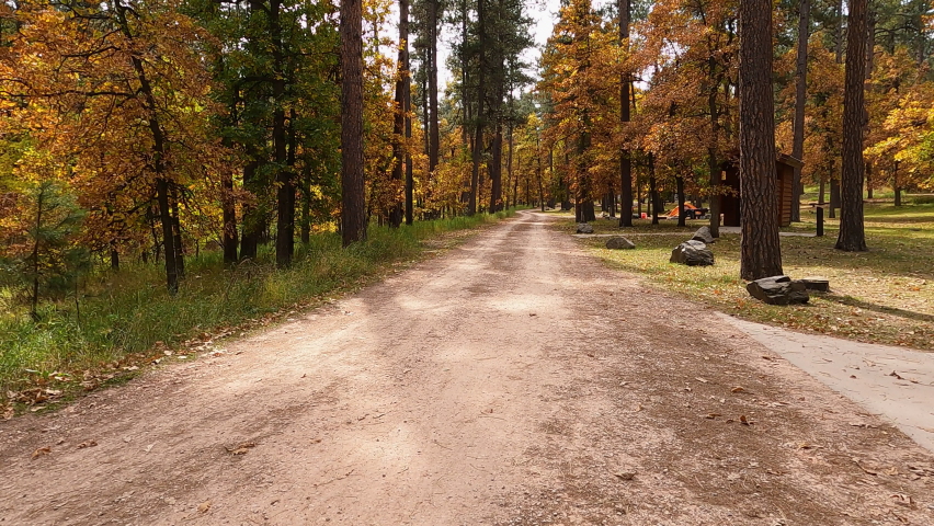 Campground autumn Custer State Park drive POV 4K. Black Hills of South Dakota. Mountain, valley, landscape scenic discovery. State Park with wildlife, lakes, campgrounds and picnic areas. 