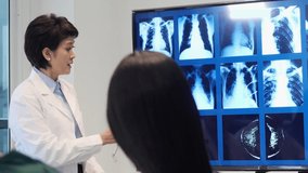 Leader medical team presenting symptoms of patient with x-ray at hospital. Doctor brainstorming examination of the symptoms patient at meeting room. - Powered by Shutterstock - Get 15% off with code: PIKWIZARD15